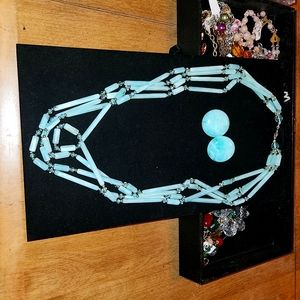 Vintage Four Strand Light Green Necklace w/ clip on earrings.